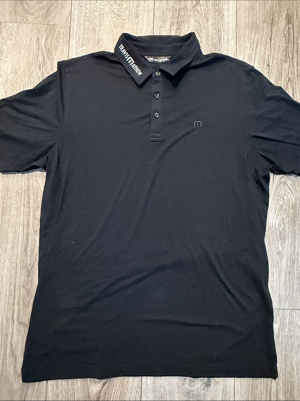 Travis Mathew Men’s Black Polo with Subtle Logo